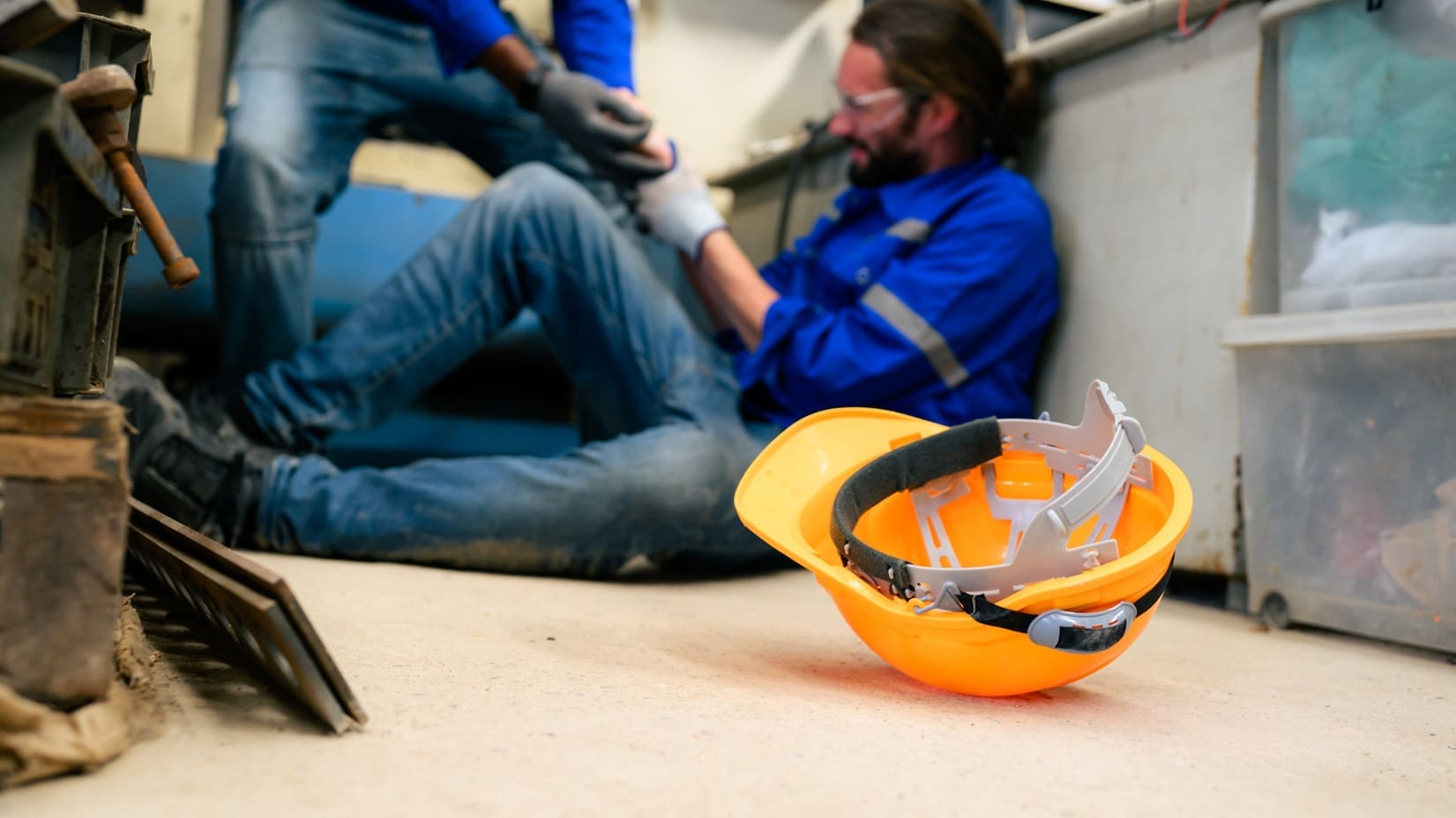 Personal Injuries At Work: What to Know blog image. Photo of an injured employee on a job site.