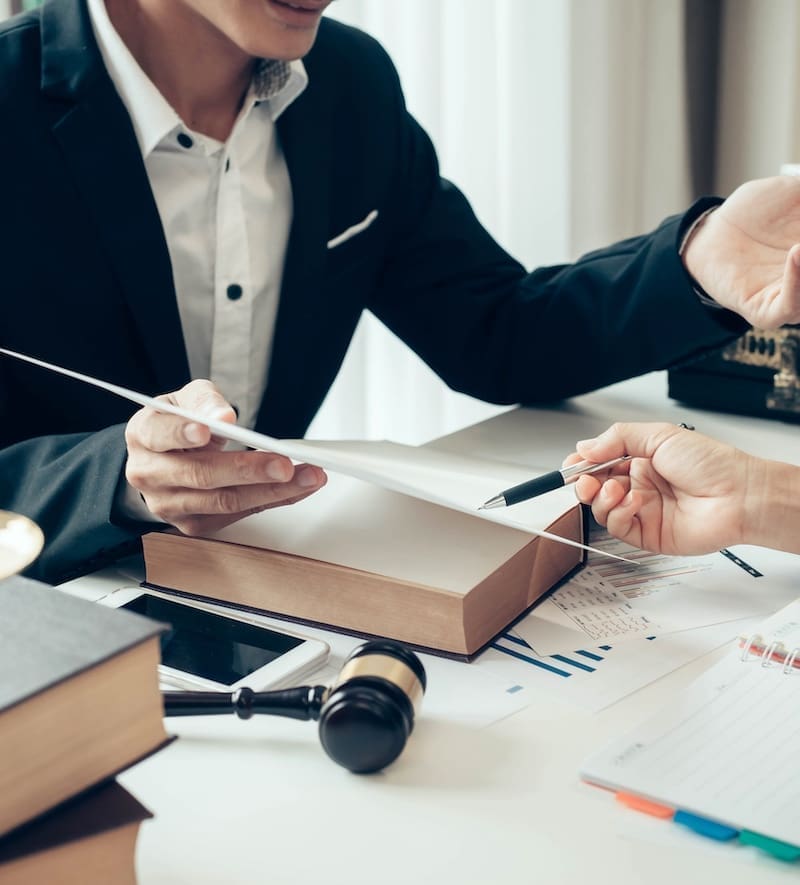 Businessman and lawyer discuss the contract document. Treaty of the law. Sign a contract business.
